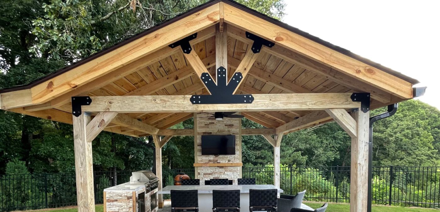 Transform Your Tennessee Backyard Into An All-Year Outdoor Living Space 1 Luxurious Tennessee outdoor living space with custom timber pavilion and masonry fireplace